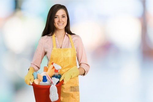 Commercial cleaners in Hackney disinfecting shared office spaces